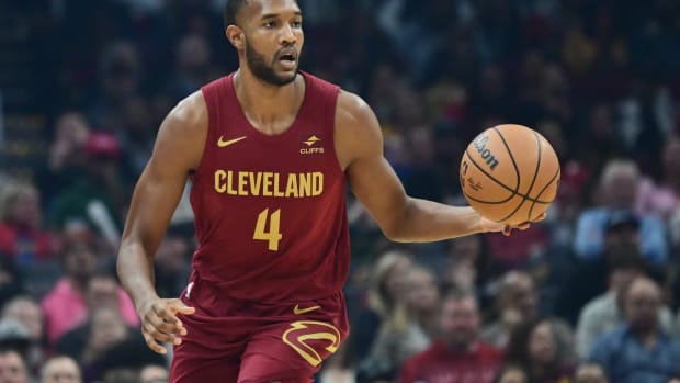 Feb 14, 2024; Cleveland, Ohio, USA; Cleveland Cavaliers forward Evan Mobley (4) brings the ball up court during the first half against the Chicago Bulls at Rocket Mortgage FieldHouse.
